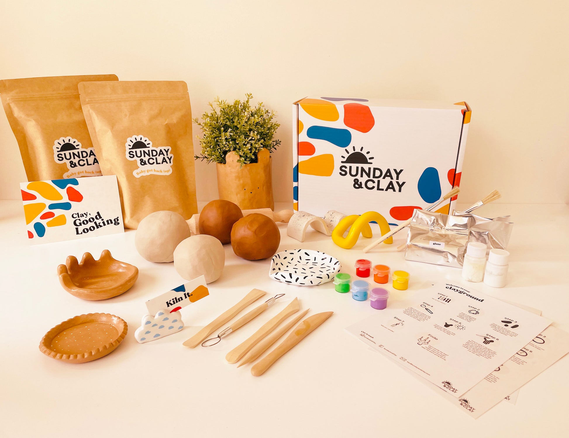 All the things to look forward to in our Sunday & Clay DIY Home Clay Kit with air dry clay, pottery tools, glaze, paint, paintbrush, inustructions and more! Get your hands dirty today. 
