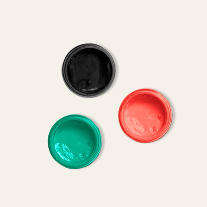 Air dry clay paint pots - green, black and red.