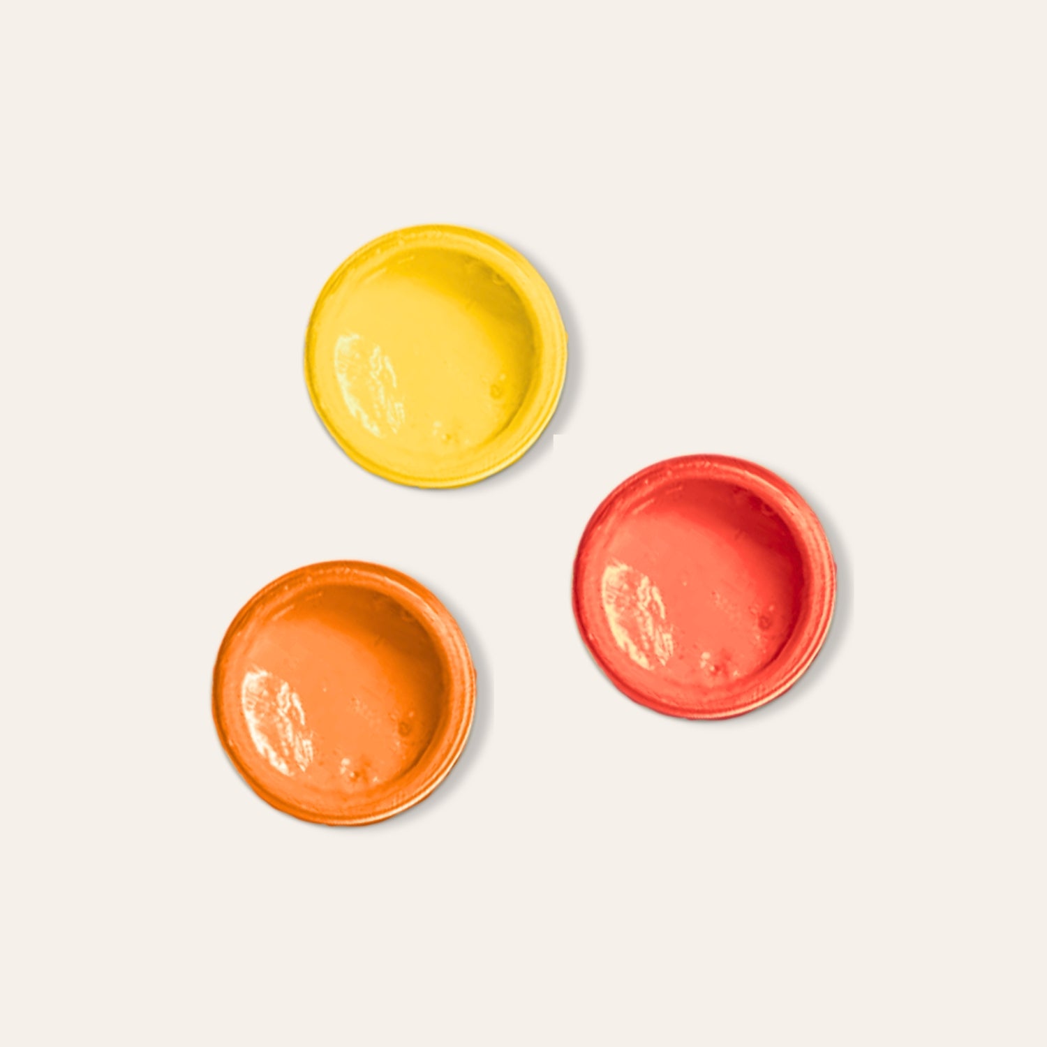 Air dry clay paint colours - yellow, orange, red.