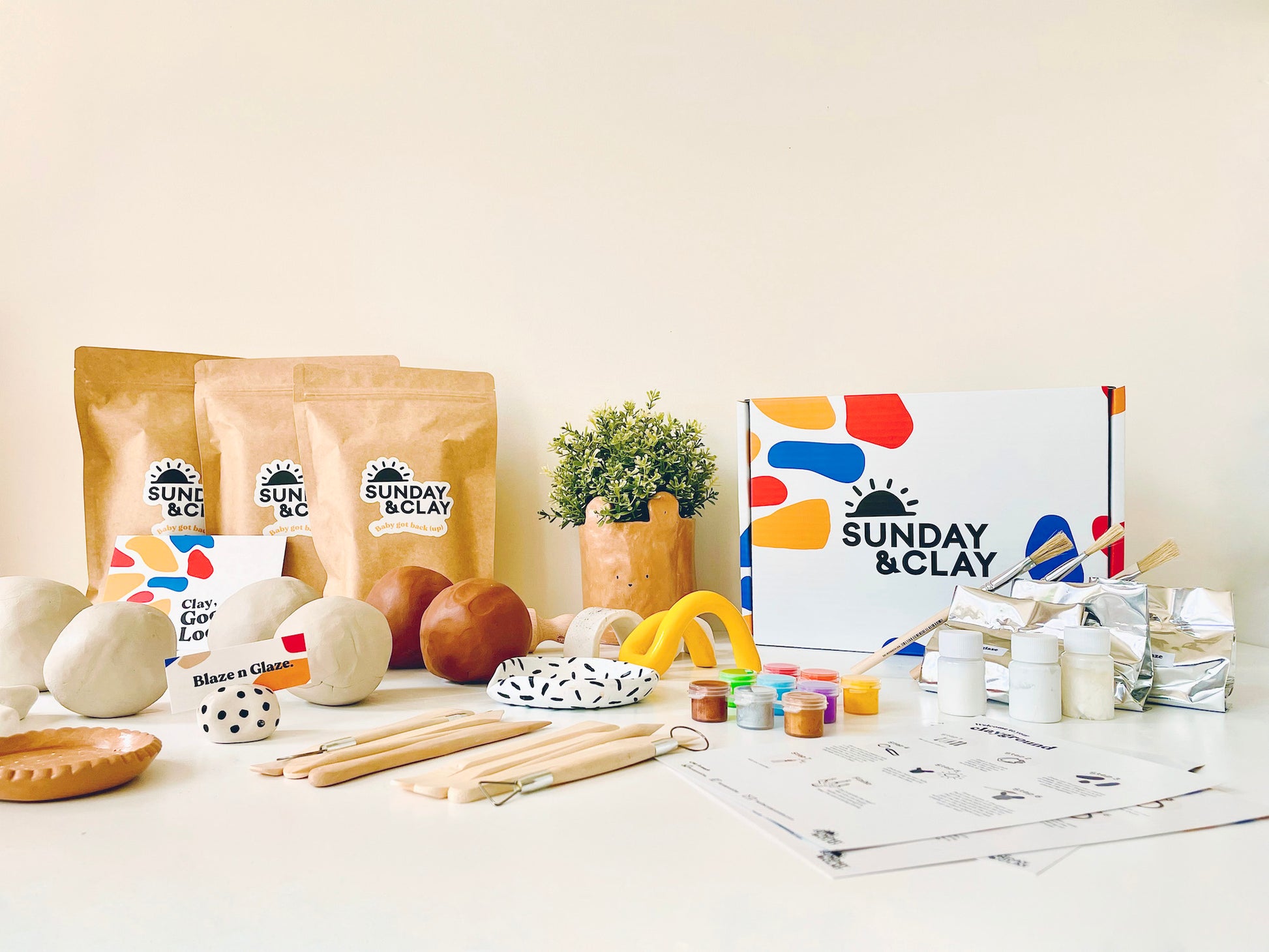 The S&C Group Party Pack includes all the things in our original Clay Kits but just a whole lot more! Air Dry Clay, clat tools, paintbrushes, glaze, pots of paint and much more! 