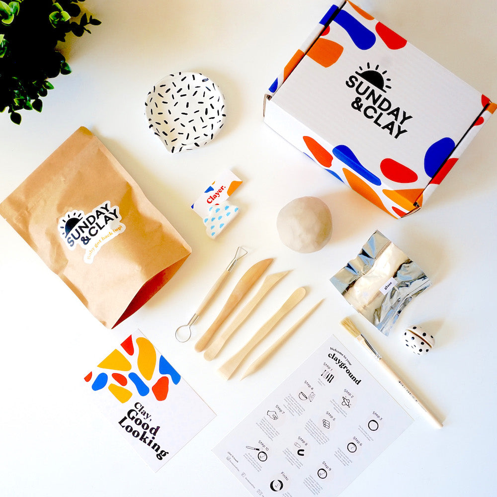 The Sunday & Clay Mini Kit with air dry clay, clay tools, instructions, glaze, paintbrush and more! All the things you can expect in our air dry clay mini kits!